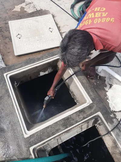 Manual tank cleaning in progress